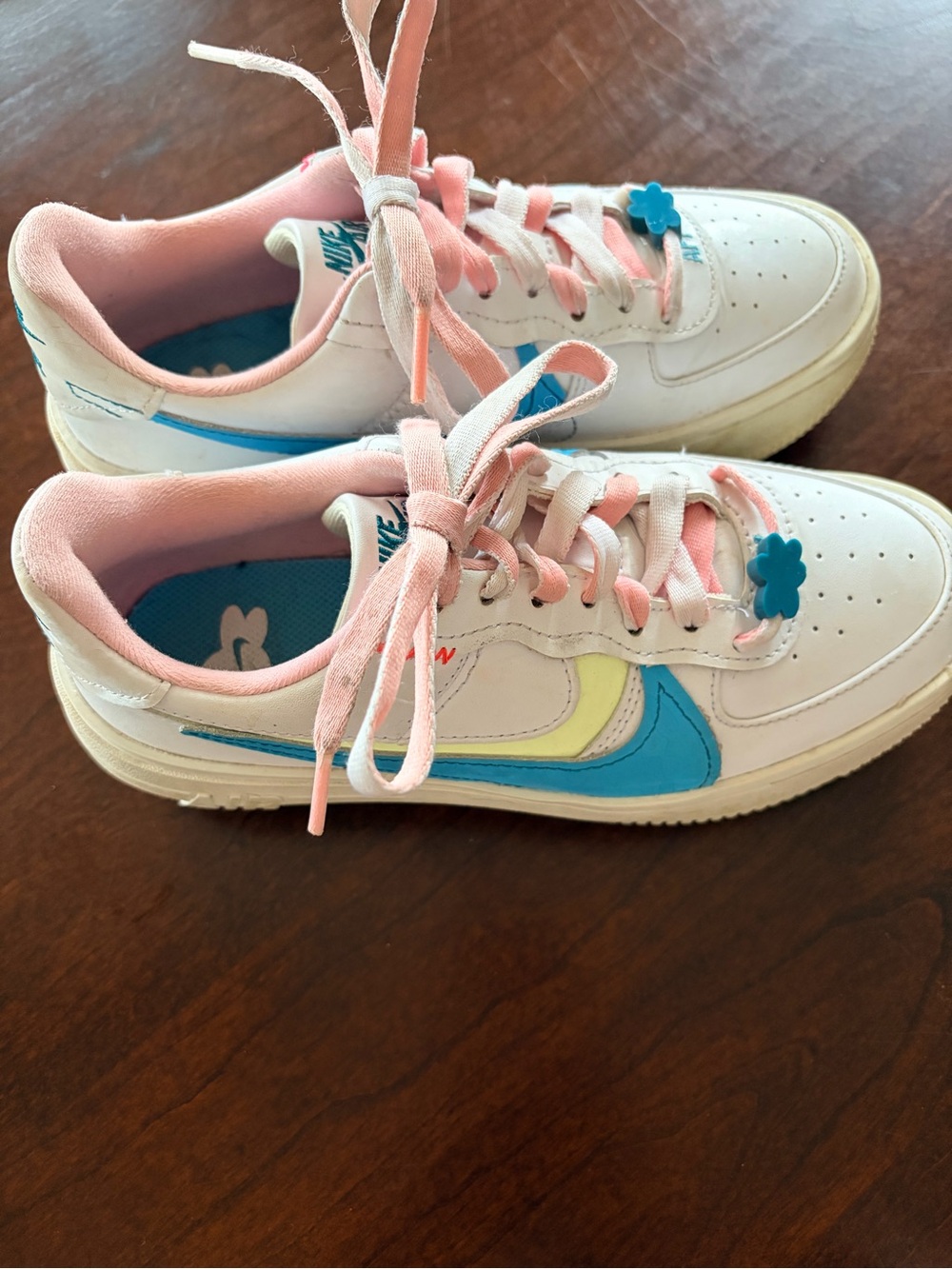 Nike Kids Low-Top Sneakers in White with Blue & Pink Accents